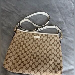 Gucci monogram flat medium bag